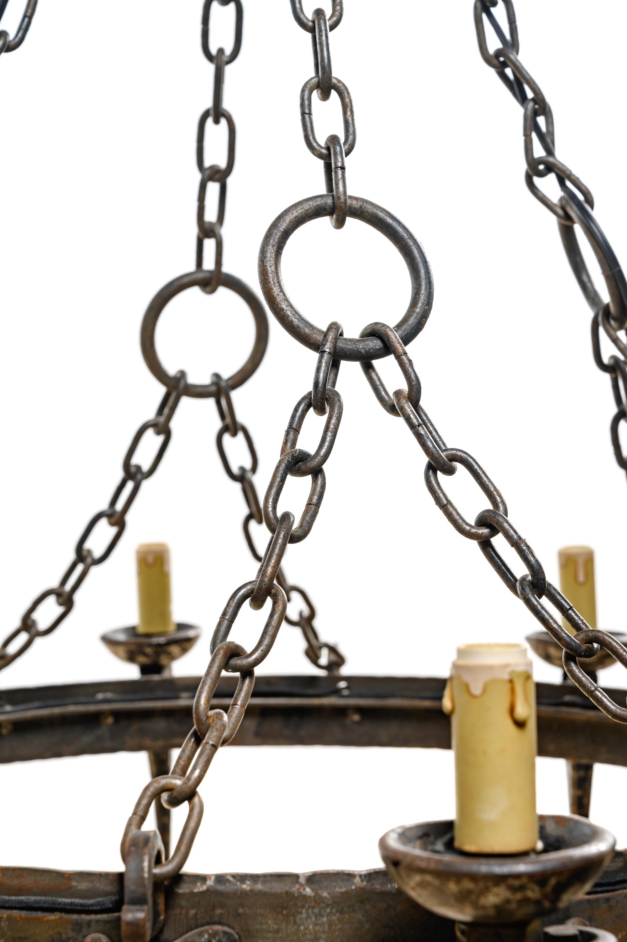 A French Provincial Wrought Iron Eight-Light Chandelier