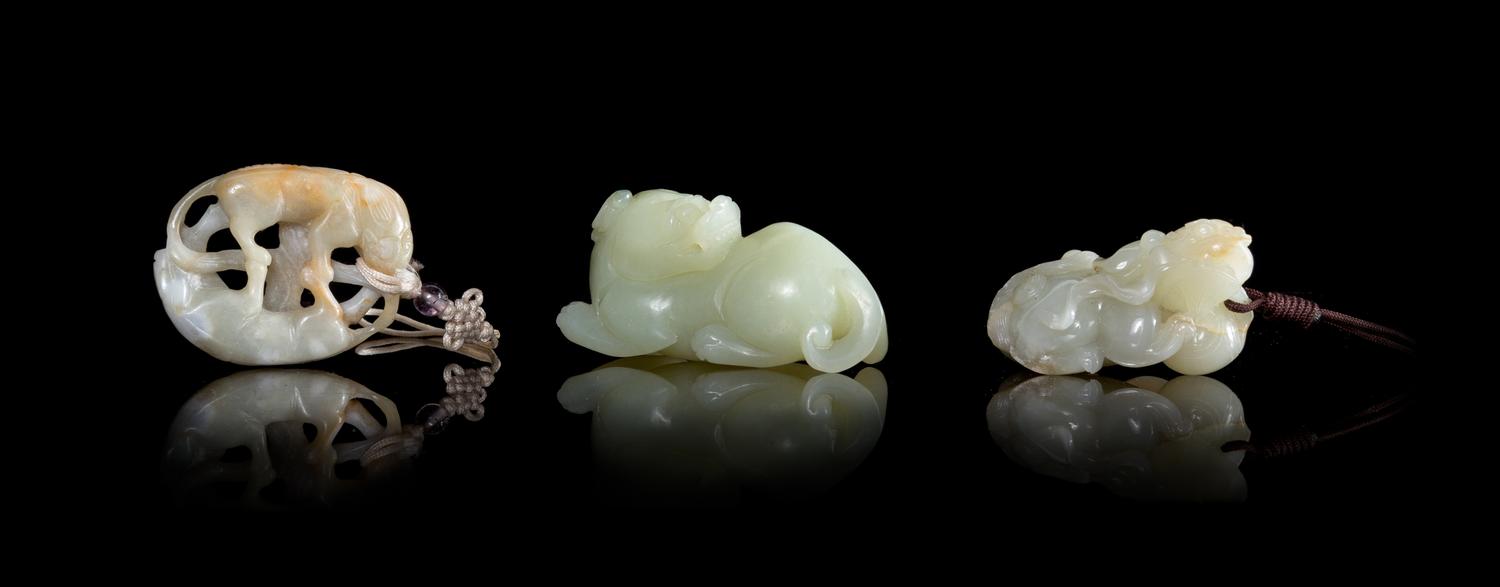 Three Celadon Jade Figures of Animals Length of largest 2 3/4 inches.