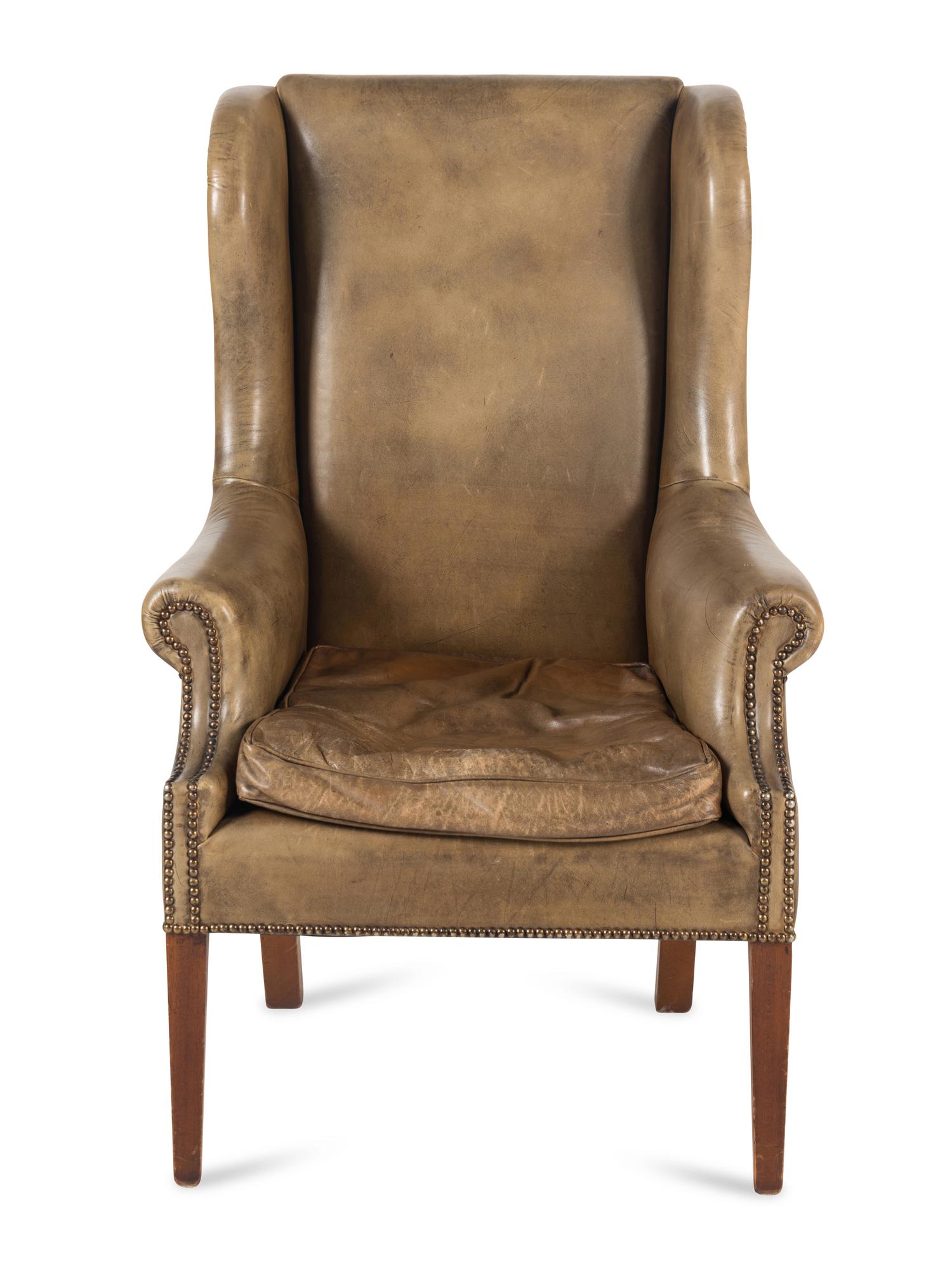 An English Mahogany Leather-Upholstered Wingback Armchair