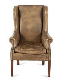 An English Mahogany Leather-Upholstered Wingback Armchair