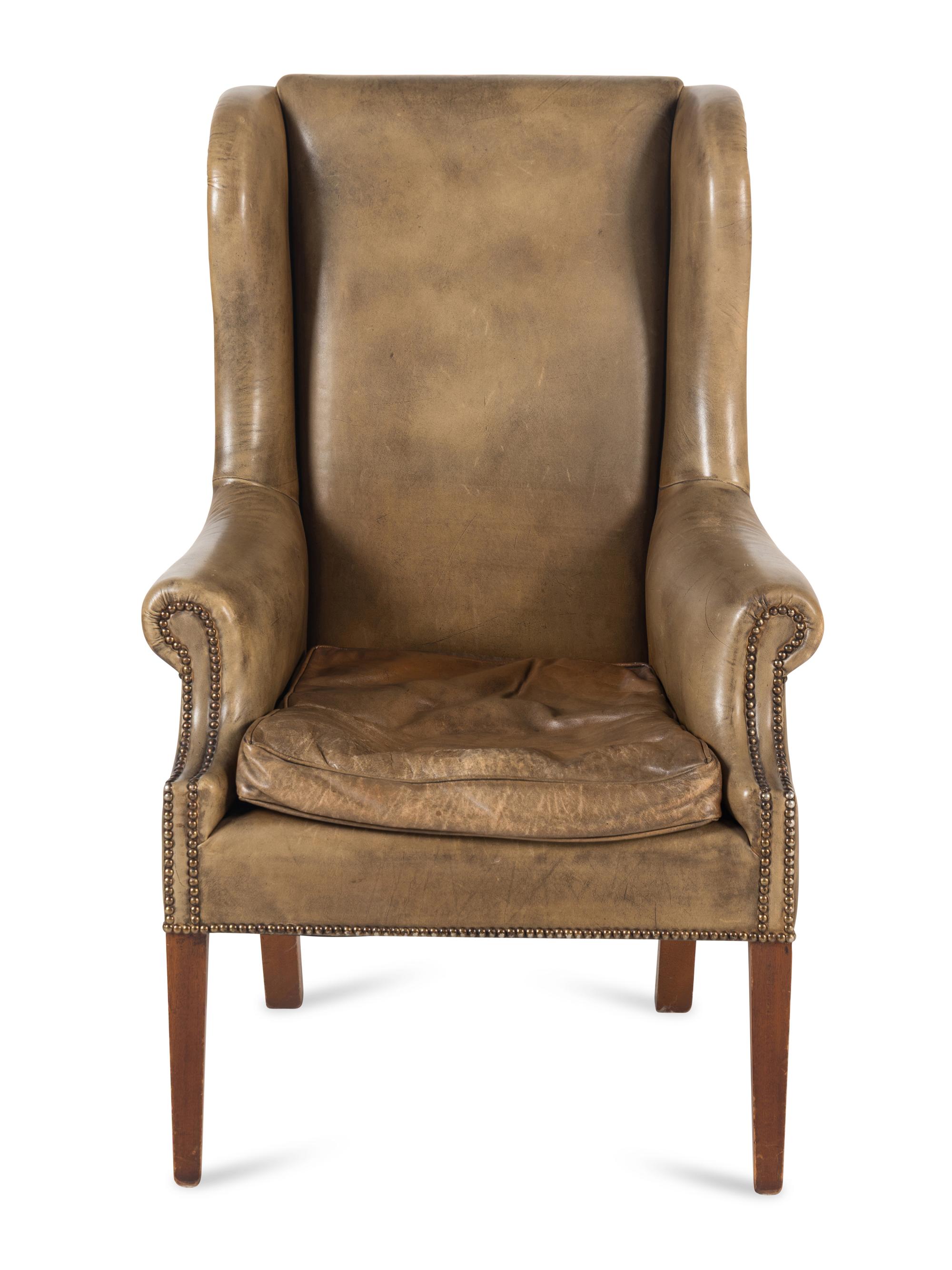 An English Mahogany Leather-Upholstered Wingback Armchair