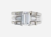 A Platinum and Diamond Ring with Ring Guards, 1.61 Carat Emerald-Cut Diamond, GIA Certified