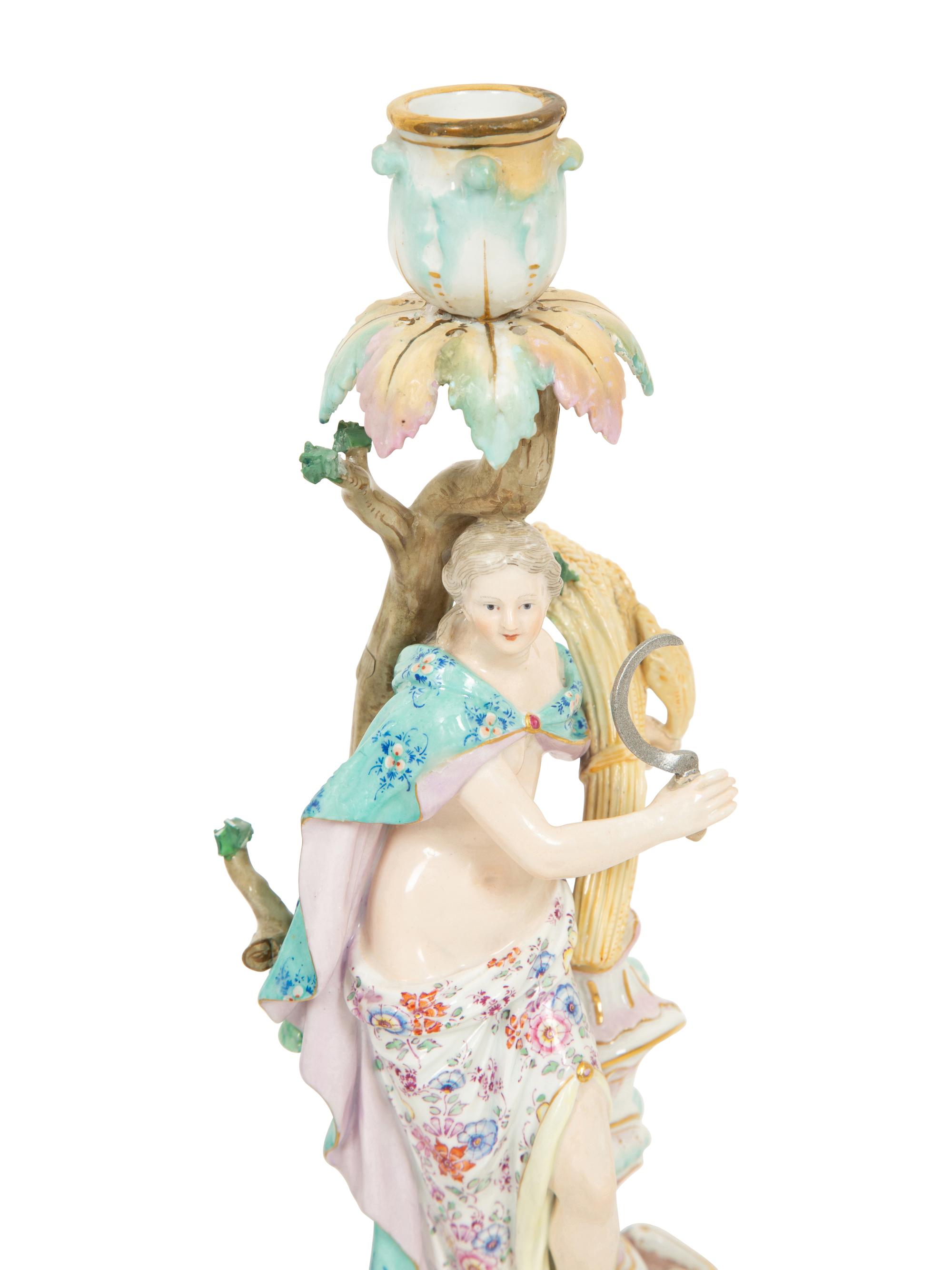 A Set of Meissen Porcelain Four Seasons Candlesticks