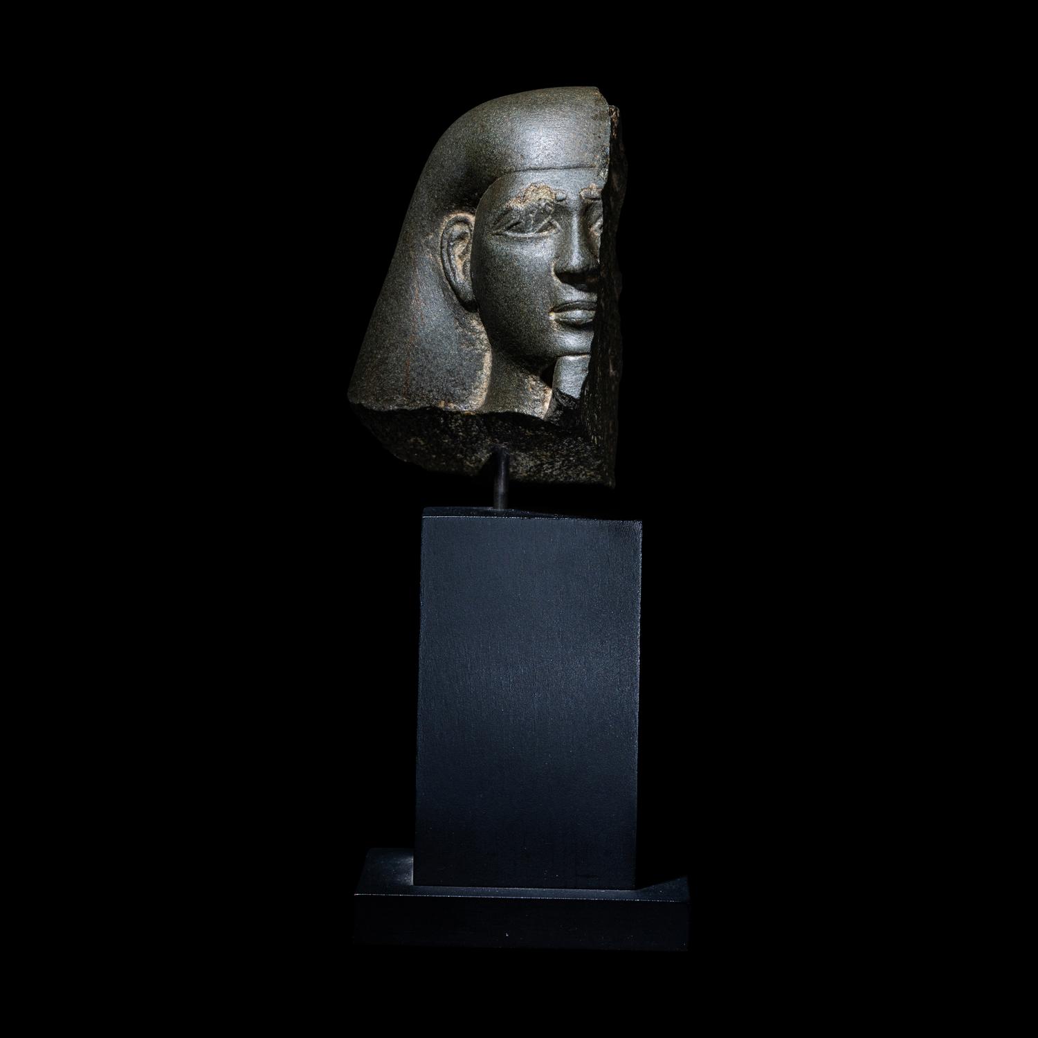 An Egyptian Schist Head of a Male