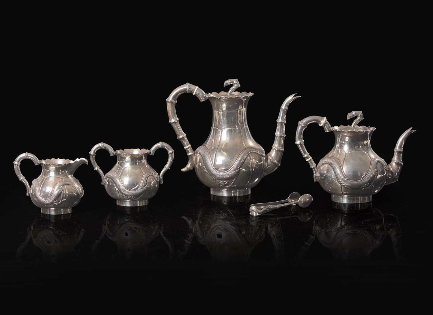 A Chinese export silver five-piece "Dragon" tea and coffee service and tongs, mark of Zeewo, Shanghai, late 19th to early 20th century 一組五件銀質咖啡器及茶具 Zeewo款 上海 十九世紀末至二十世紀初