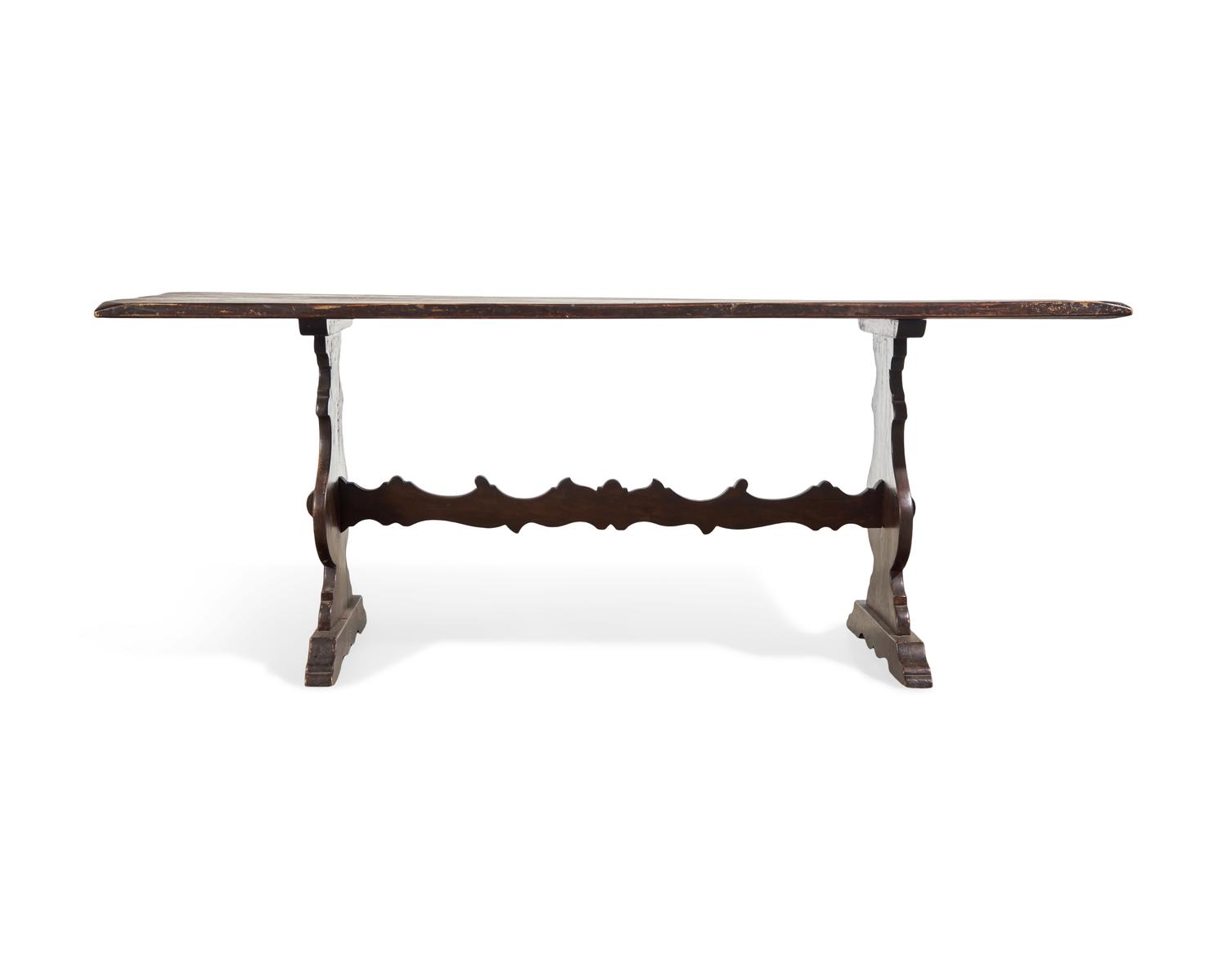A Baroque Style Stained Fruitwood Trestle Table