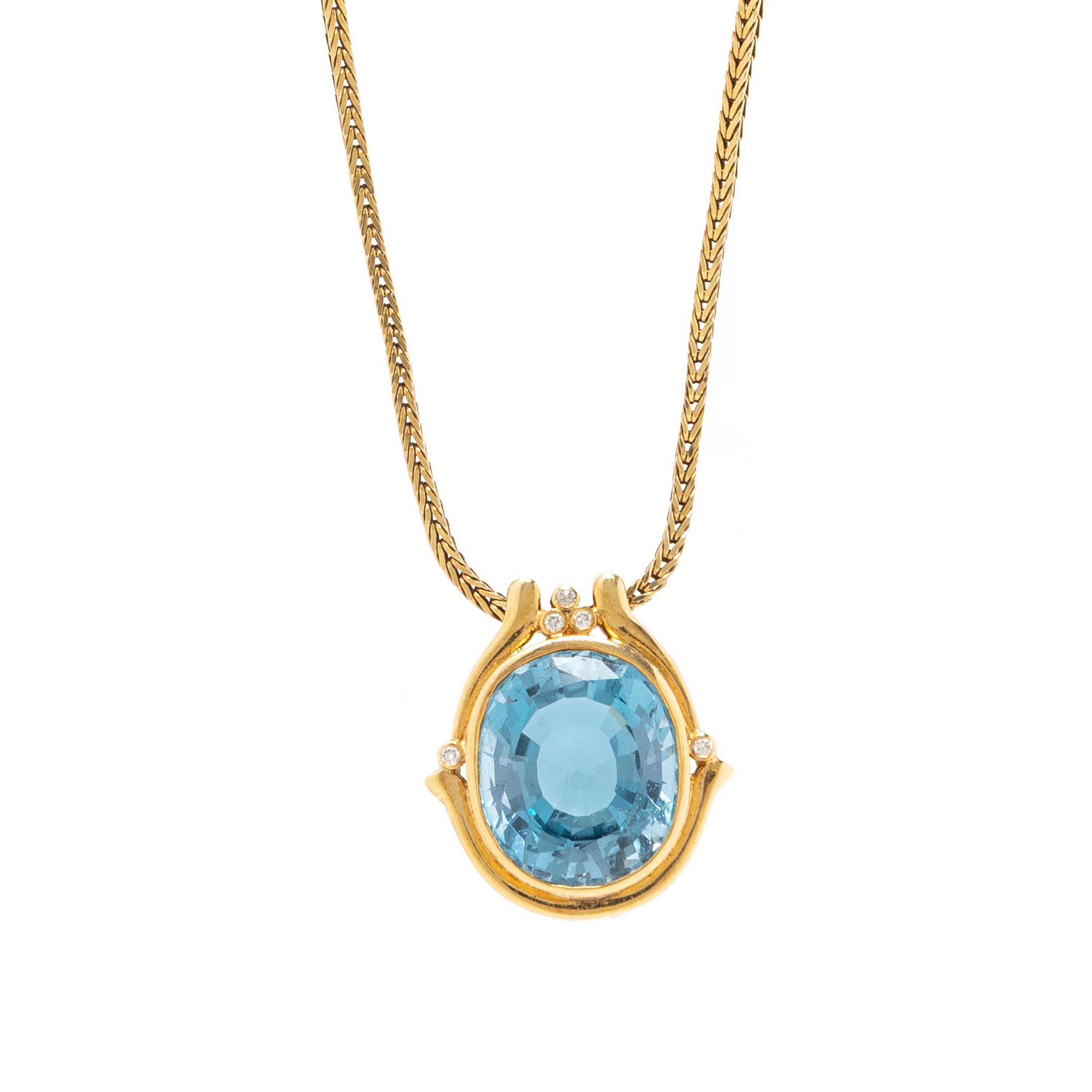 YELLOW GOLD, BLUE TOPAZ, AND DIAMOND PENDANT NECKLACE