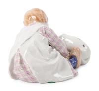 A Meissen Porcelain Figural Group of a Child Feeding Dog, by Konrad Hentschel