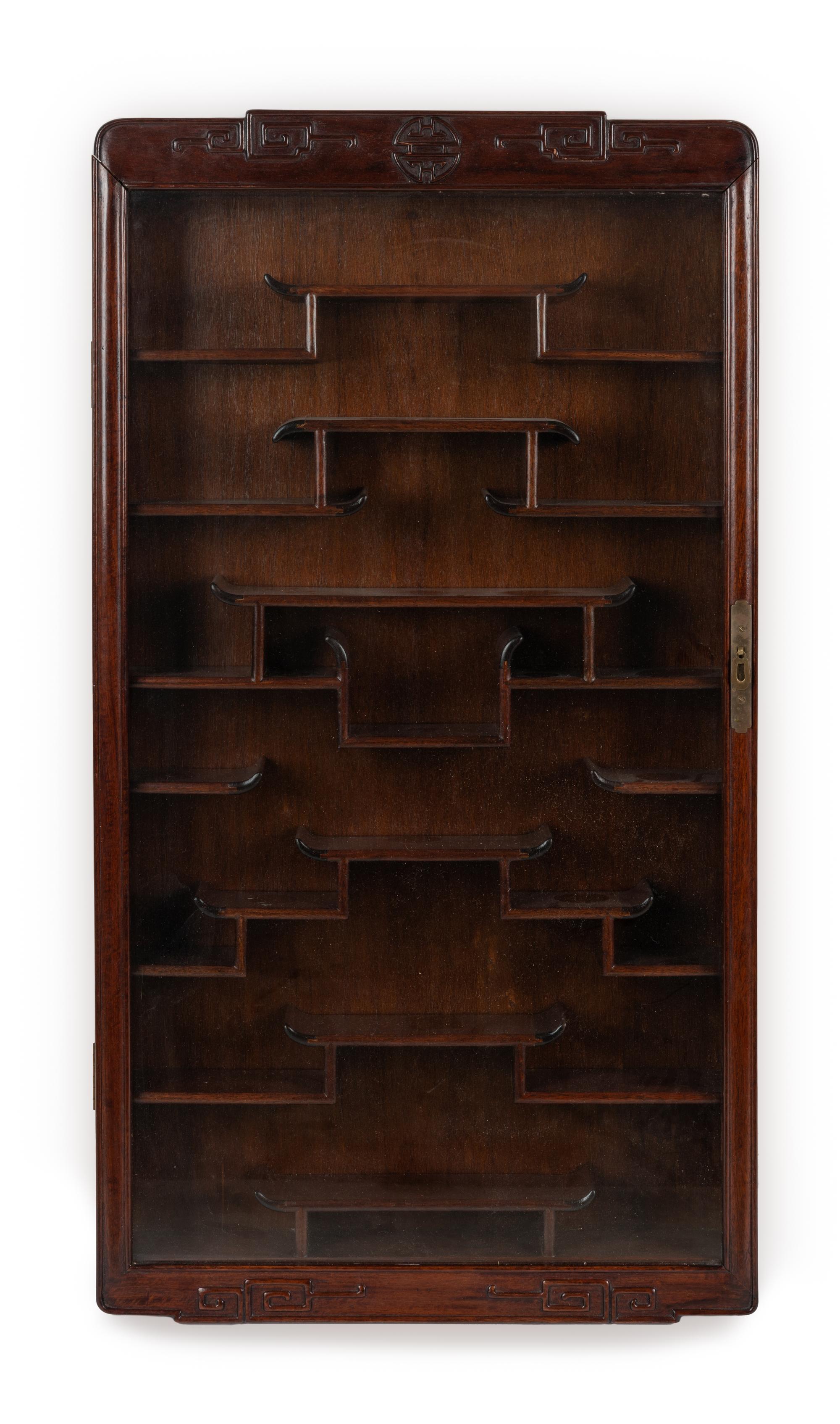 A Pair of Chinese Carved Hardwood Vitrine Cabinets