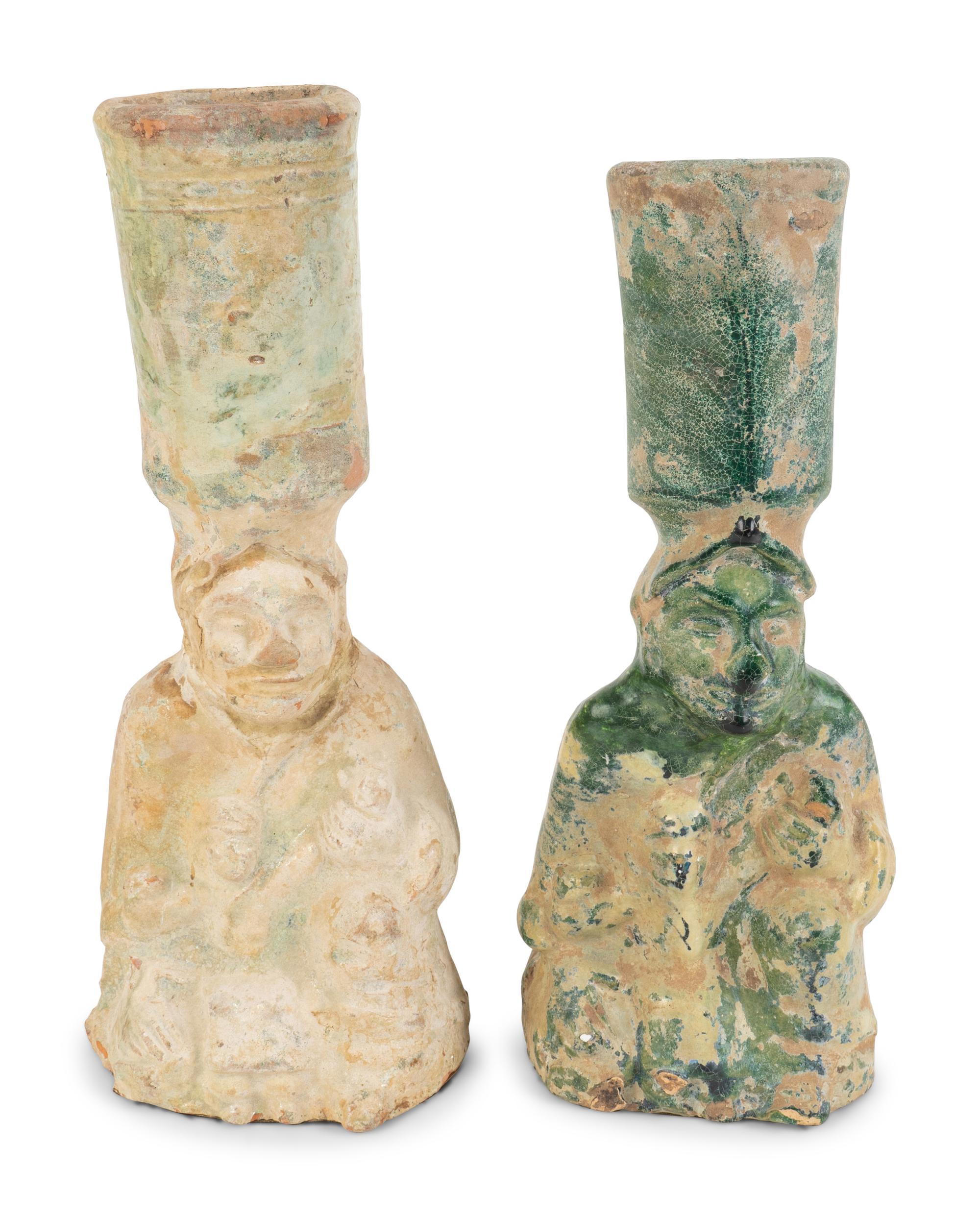 Two Chinese Glazed Terracotta Figural Lampstands — EASTERN HAN DYNASTY