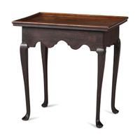 A Queen Anne Black Painted Cherrywood Dish Top Tea Table