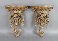 A Pair of Rococo Style Giltwood Brackets, Height 17 inches.