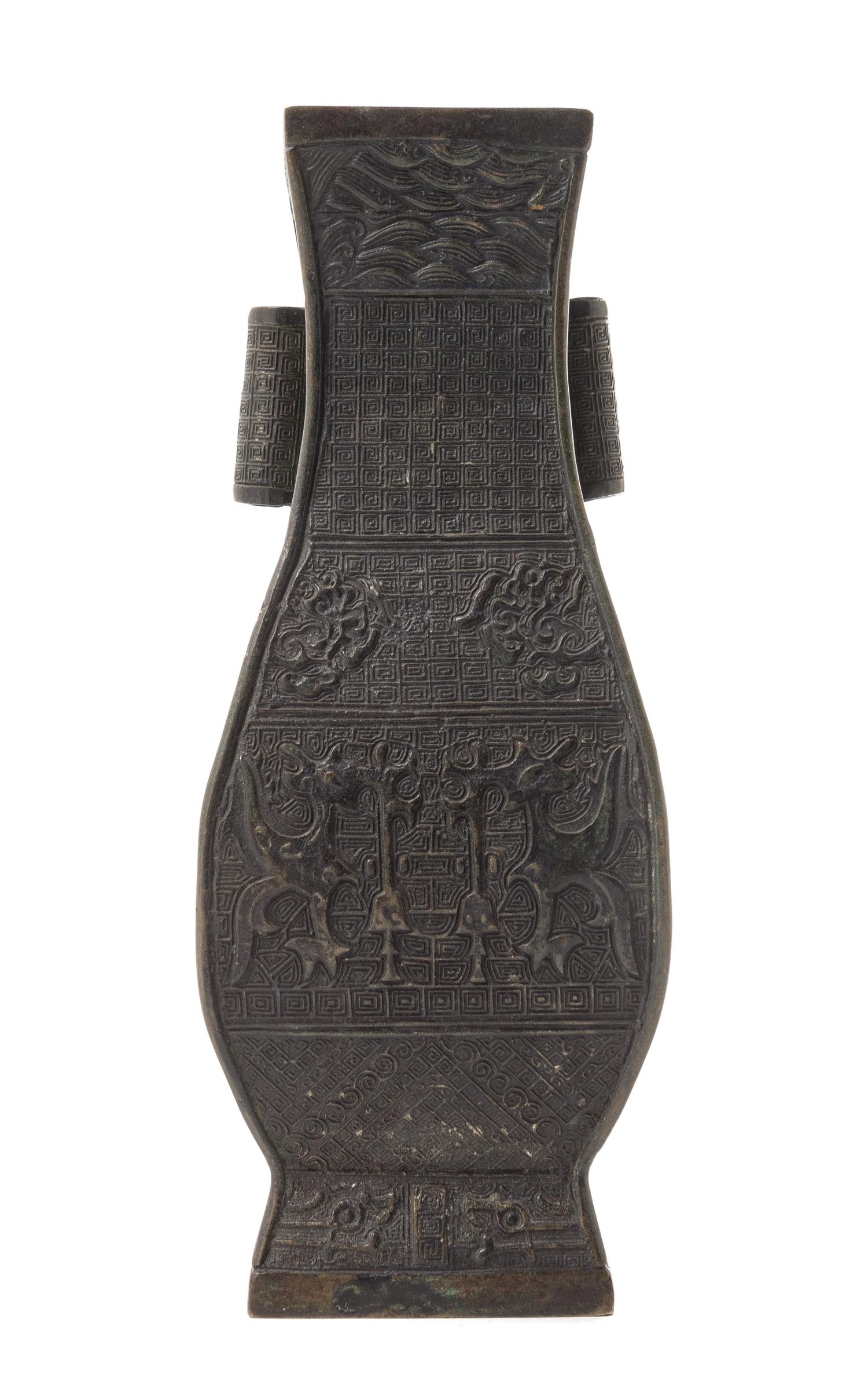 An Archaistic Bronze Vase Height 8 3/4 inches.
