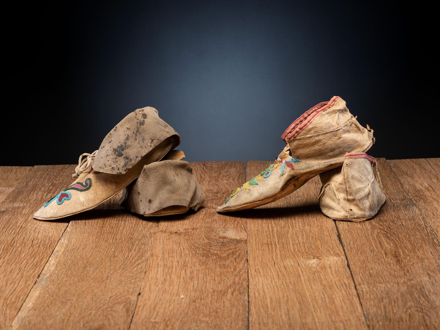 Santee Sioux and Apsáalooke Beaded Hide Moccasins