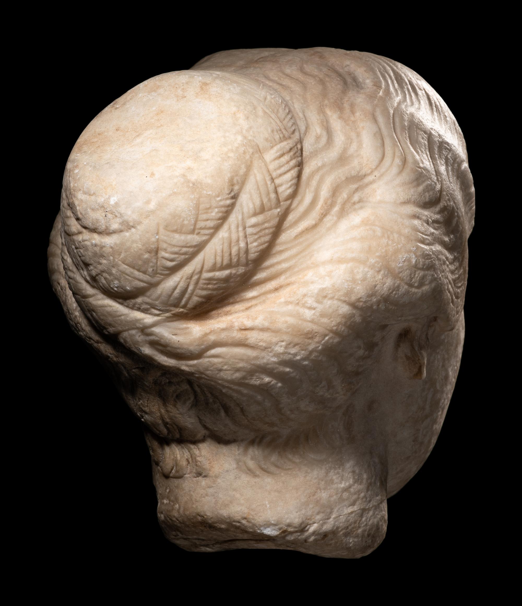 A Roman Marble Portrait Head of a Young Lady