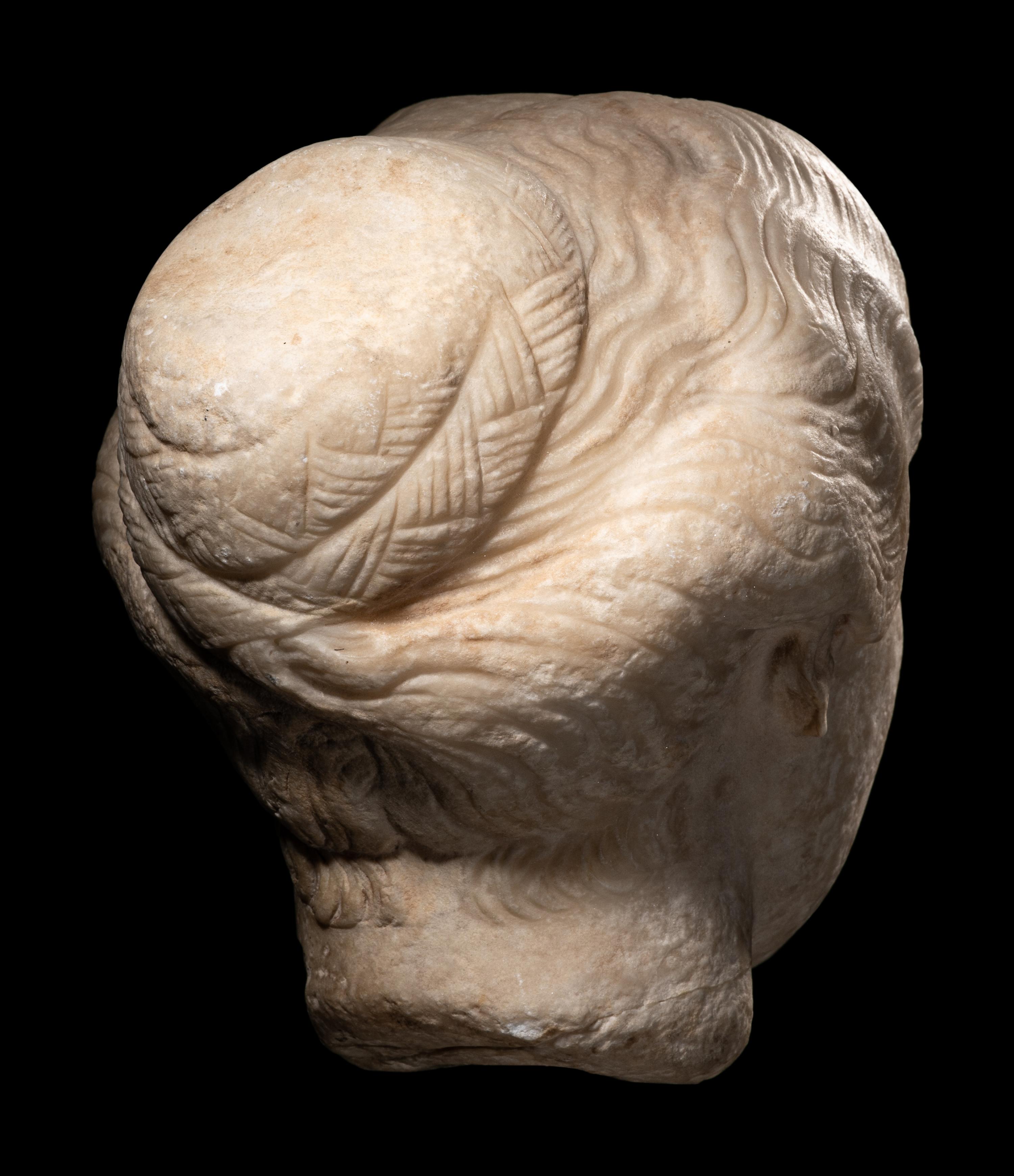 A Roman Marble Portrait Head of a Young Lady