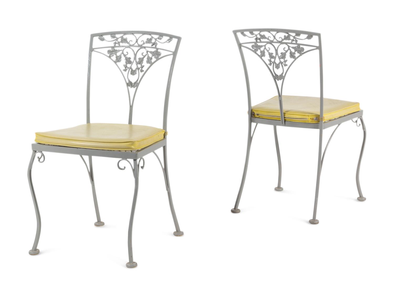 A Woodard "Orleans" Style Painted Iron Garden Table and Four Chairs