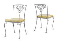 A Woodard "Orleans" Style Painted Iron Garden Table and Four Chairs