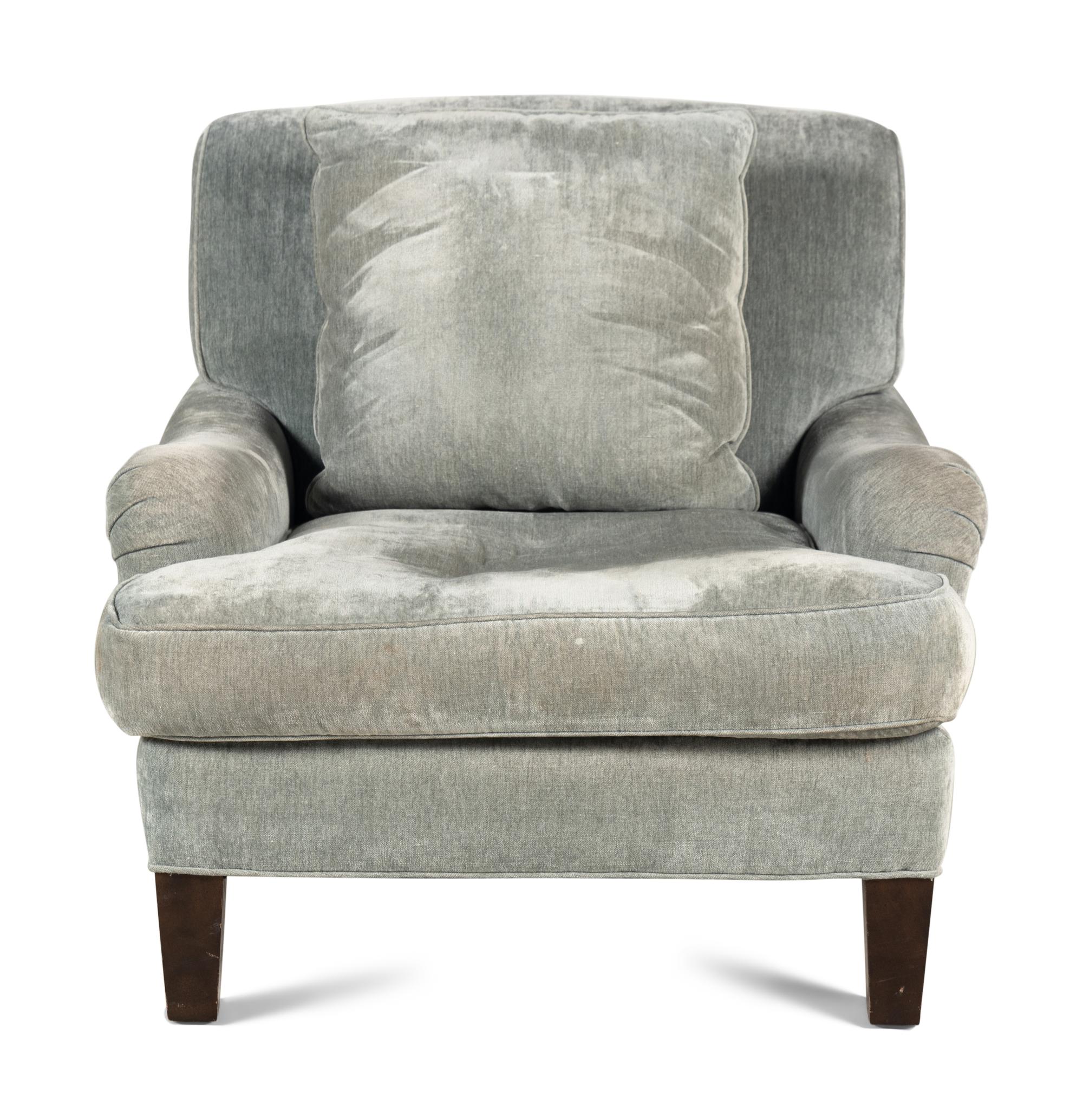 A Lounge Chair together with an Ottoman