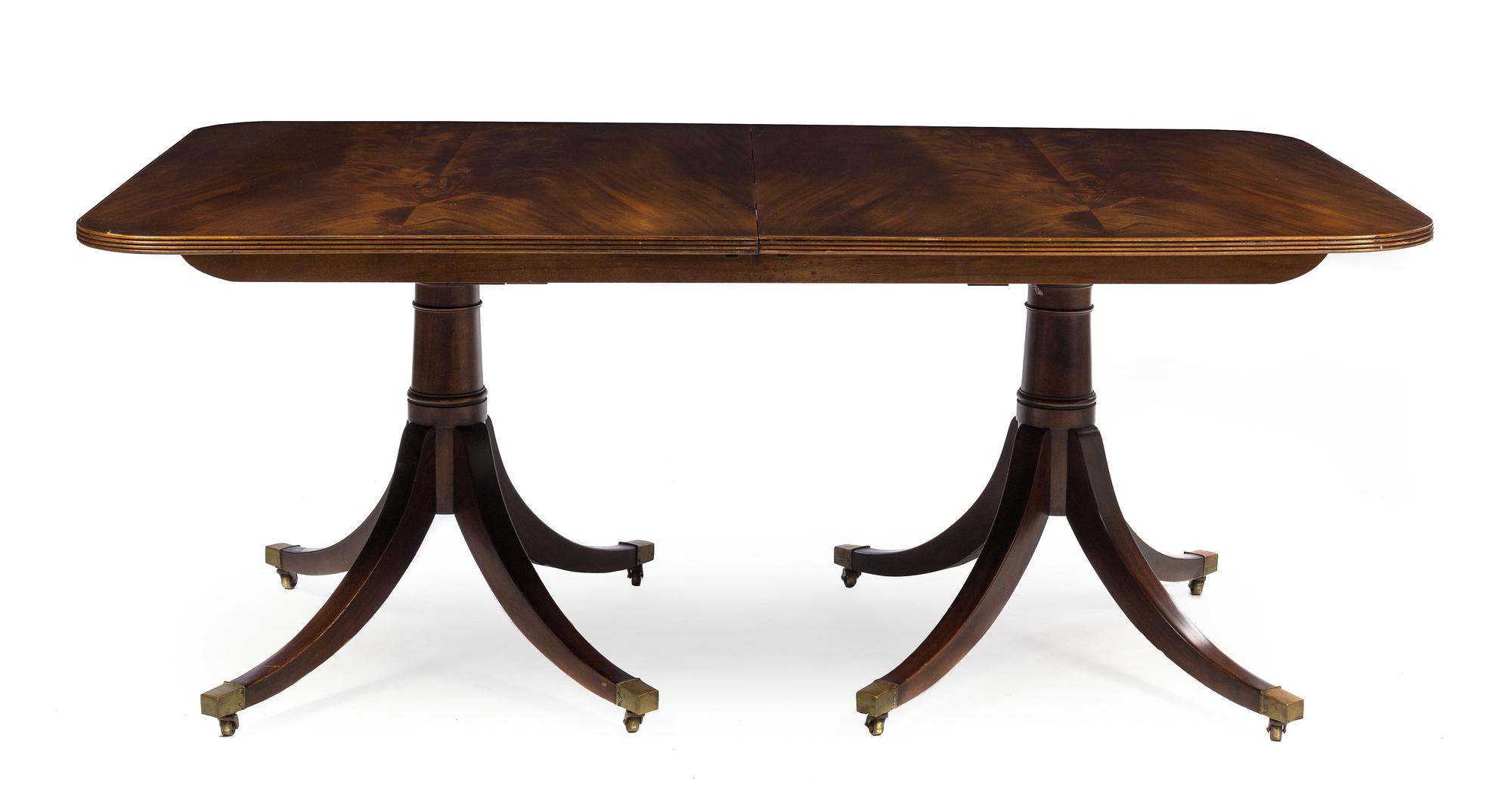 A George III Mahogany Extension Table Height 29 1/2 x width 70 x depth 35 inches (closed). — 19TH CENTURY