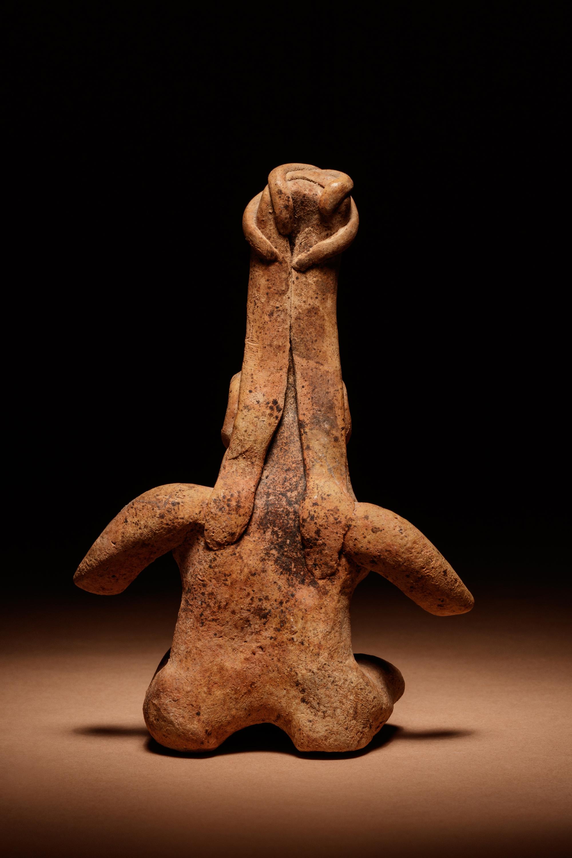 A Jalisco Terracotta Seated Figure