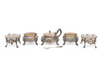 A Pair of English Silver-Gilt Footed Salt Cellars and Covered Condiment Bowl