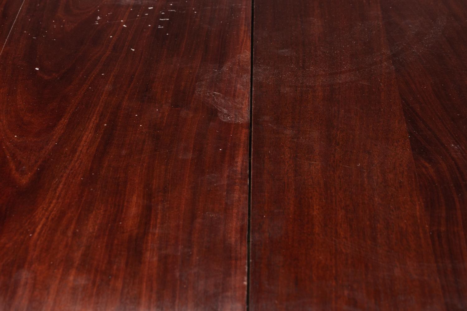 A Directoire Brass Mounted Mahogany Dining Table