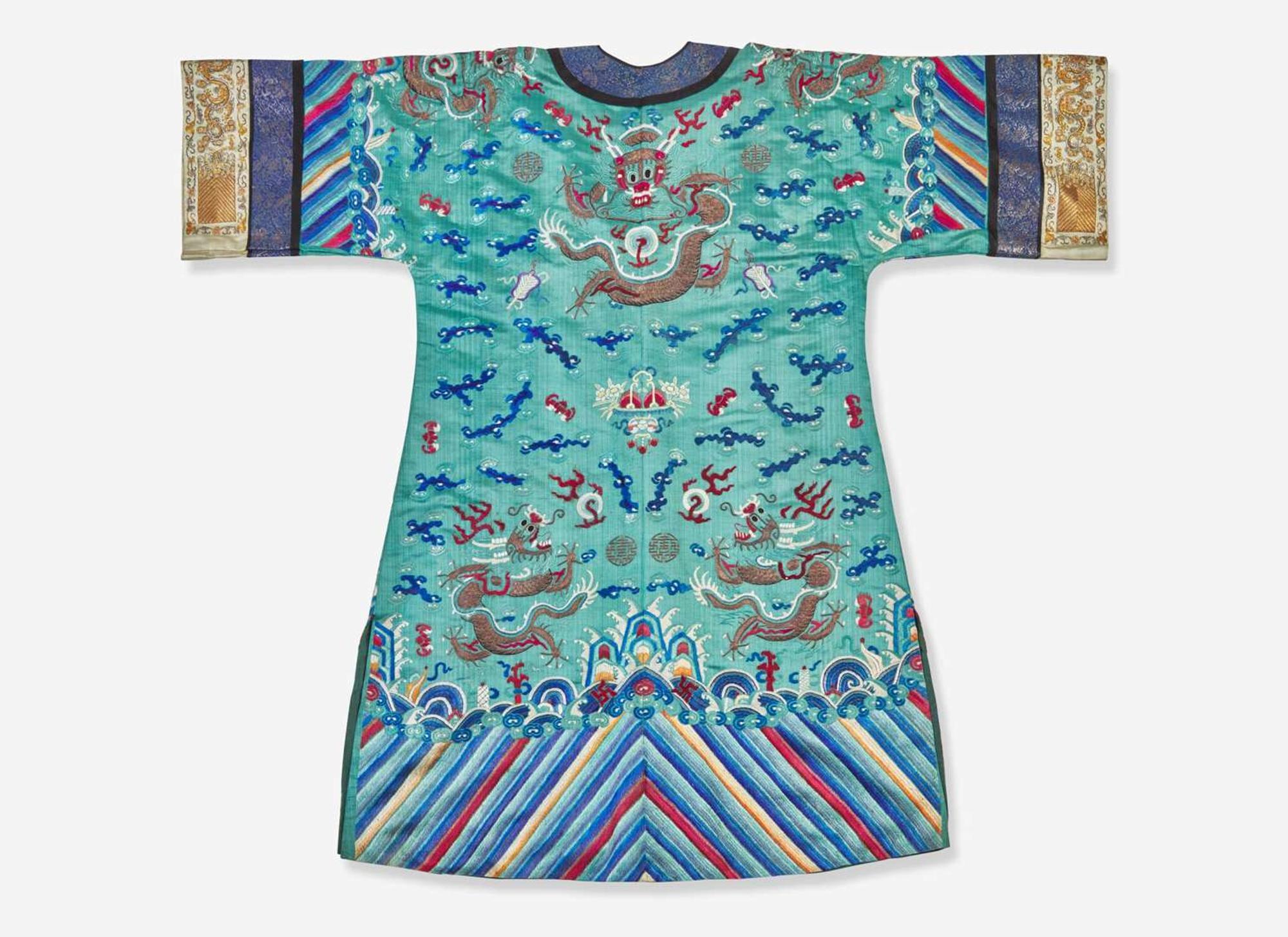 A Chinese embroidered teal blue silk "Dragon" surcoat, late 19th to 20th century 刺繡青藍龍紋袍 十九或二十世紀