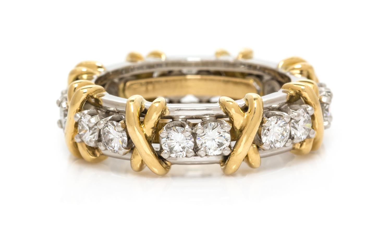 A Platinum, 18 Karat Yellow Gold and Diamond 'Sixteen Stone' Ring, Schlumberger for Tiffany & Co., 5.95 dwts.