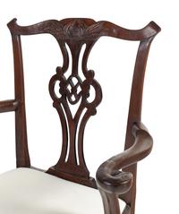 A George III Carved Walnut Open Armchair