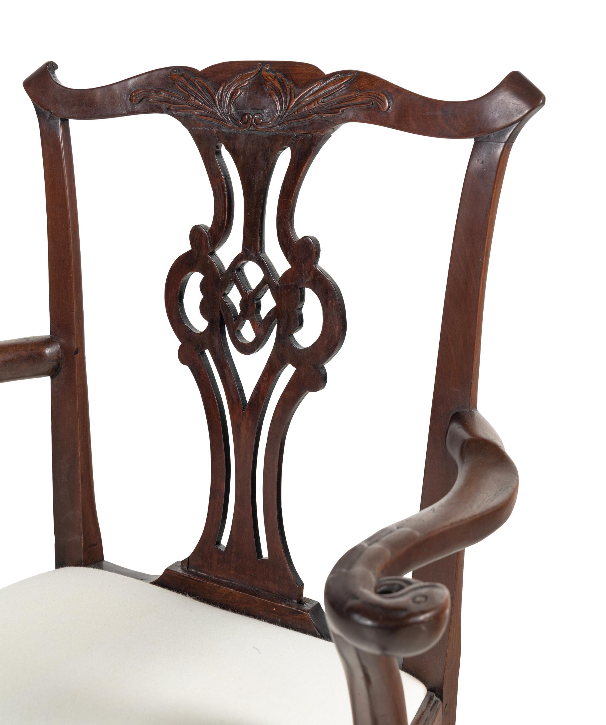 A George III Carved Walnut Open Armchair