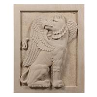 A Pair of Large Carved Granite Reliefs of Griffins