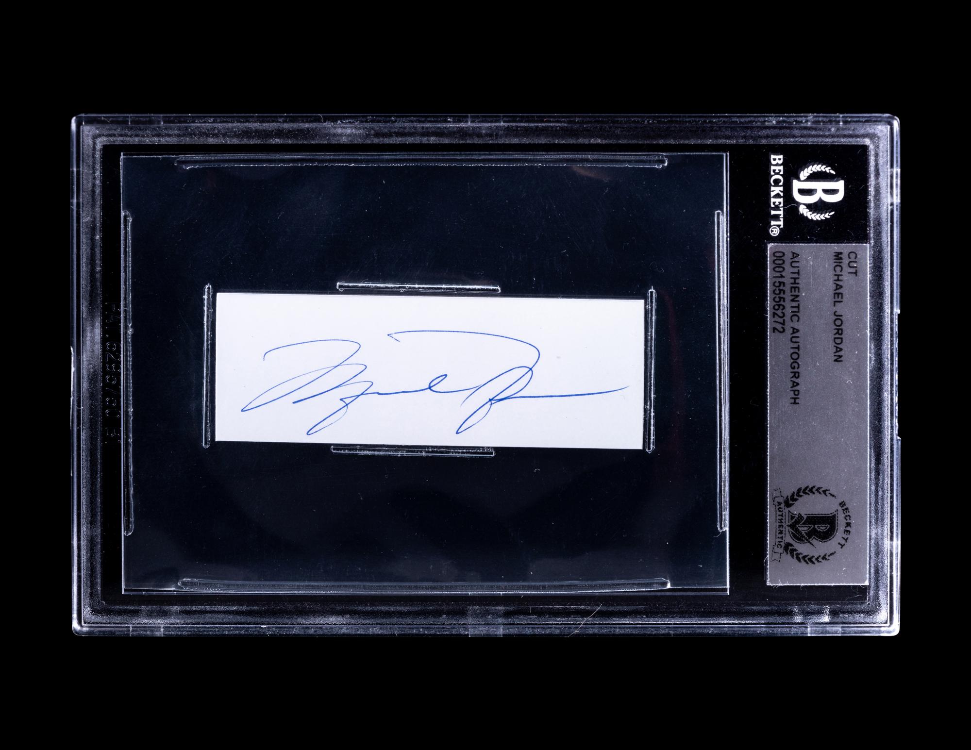 A Michael Jordan Signed Autograph Cut (Beckett Authentication Services Encapsulated)