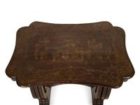 A Set of Three Chinese Export Quartetto Tables in Red and Gilt Lacquer