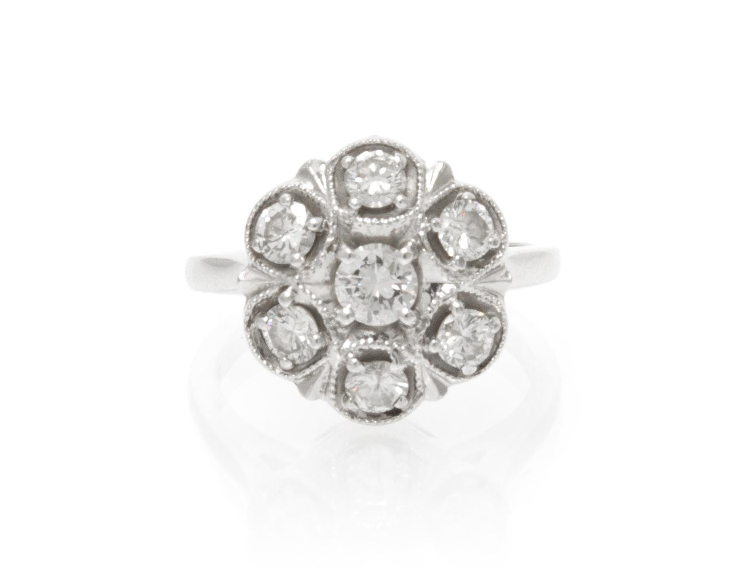 A 14 Karat White Gold and Diamond Ring, 3.70 dwts.
