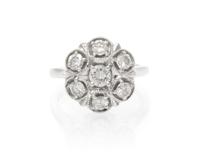A 14 Karat White Gold and Diamond Ring, 3.70 dwts.