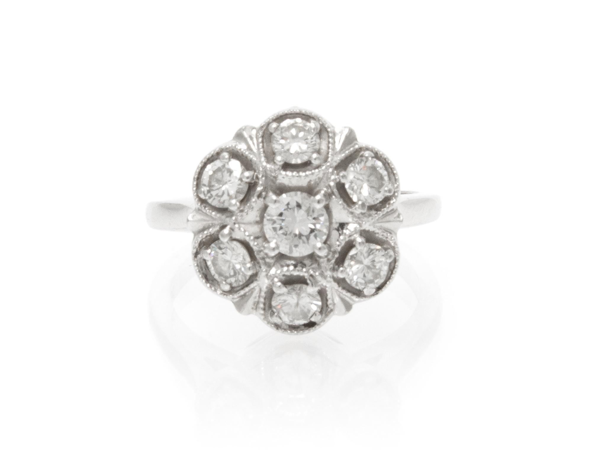 A 14 Karat White Gold and Diamond Ring, 3.70 dwts.