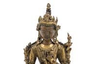 A Tibetan Gilt Bronze Seated Figure of Maitreya