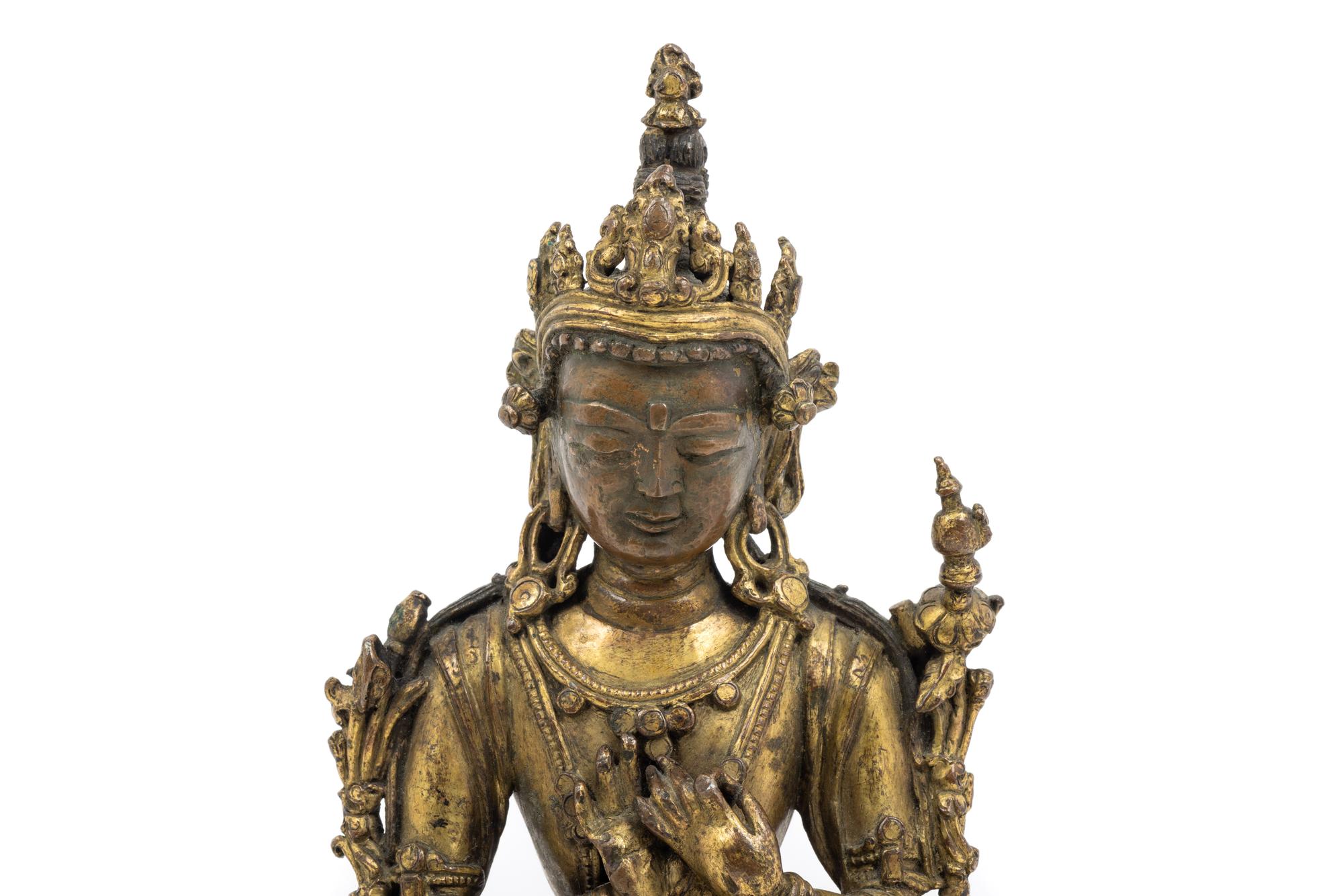 A Tibetan Gilt Bronze Seated Figure of Maitreya