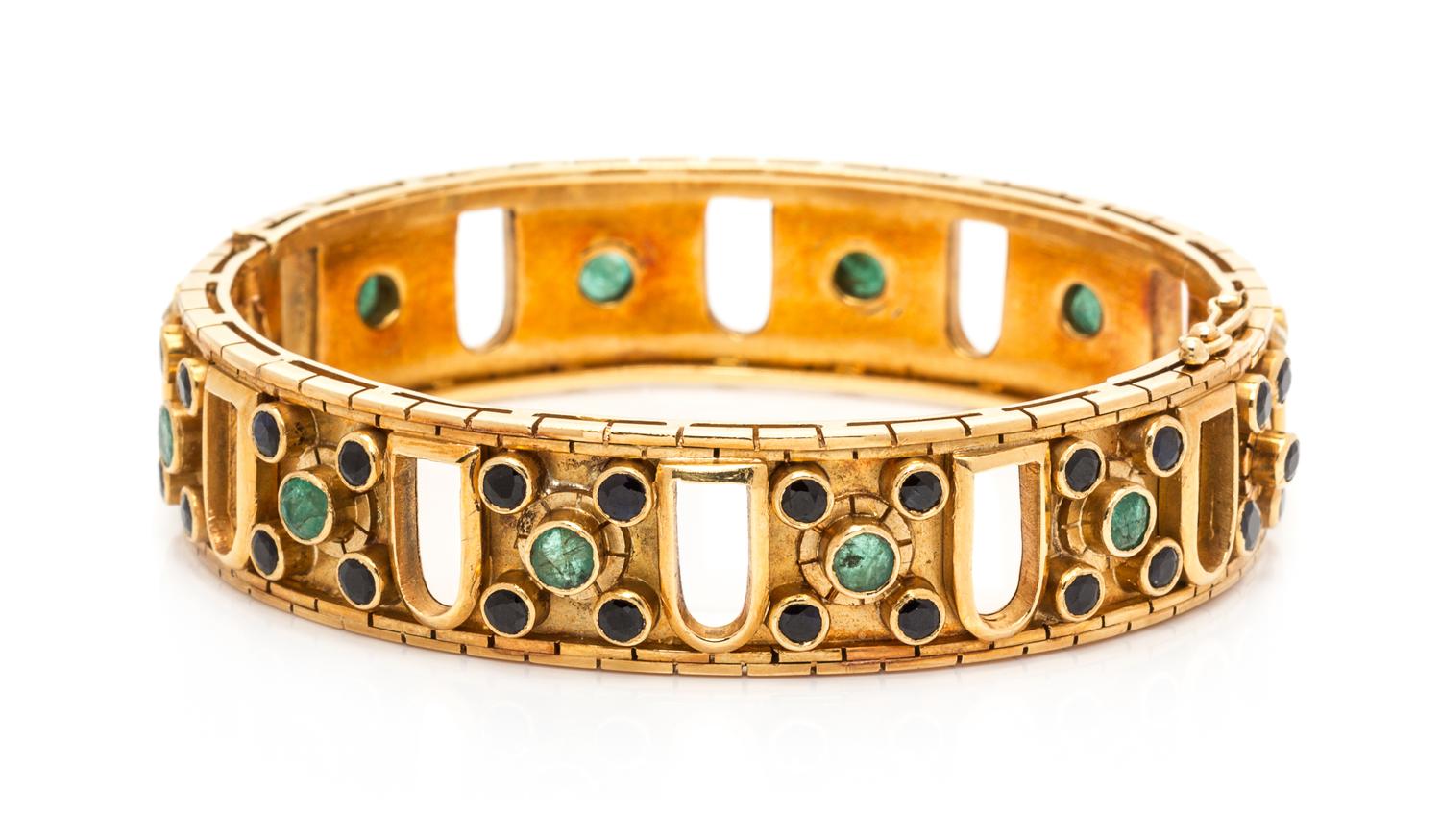 An 18 Karat Yellow Gold, Sapphire and Emerald Bangle Bracelet, Lalaounis, 36.65 dwts.