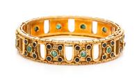 An 18 Karat Yellow Gold, Sapphire and Emerald Bangle Bracelet, Lalaounis, 36.65 dwts.