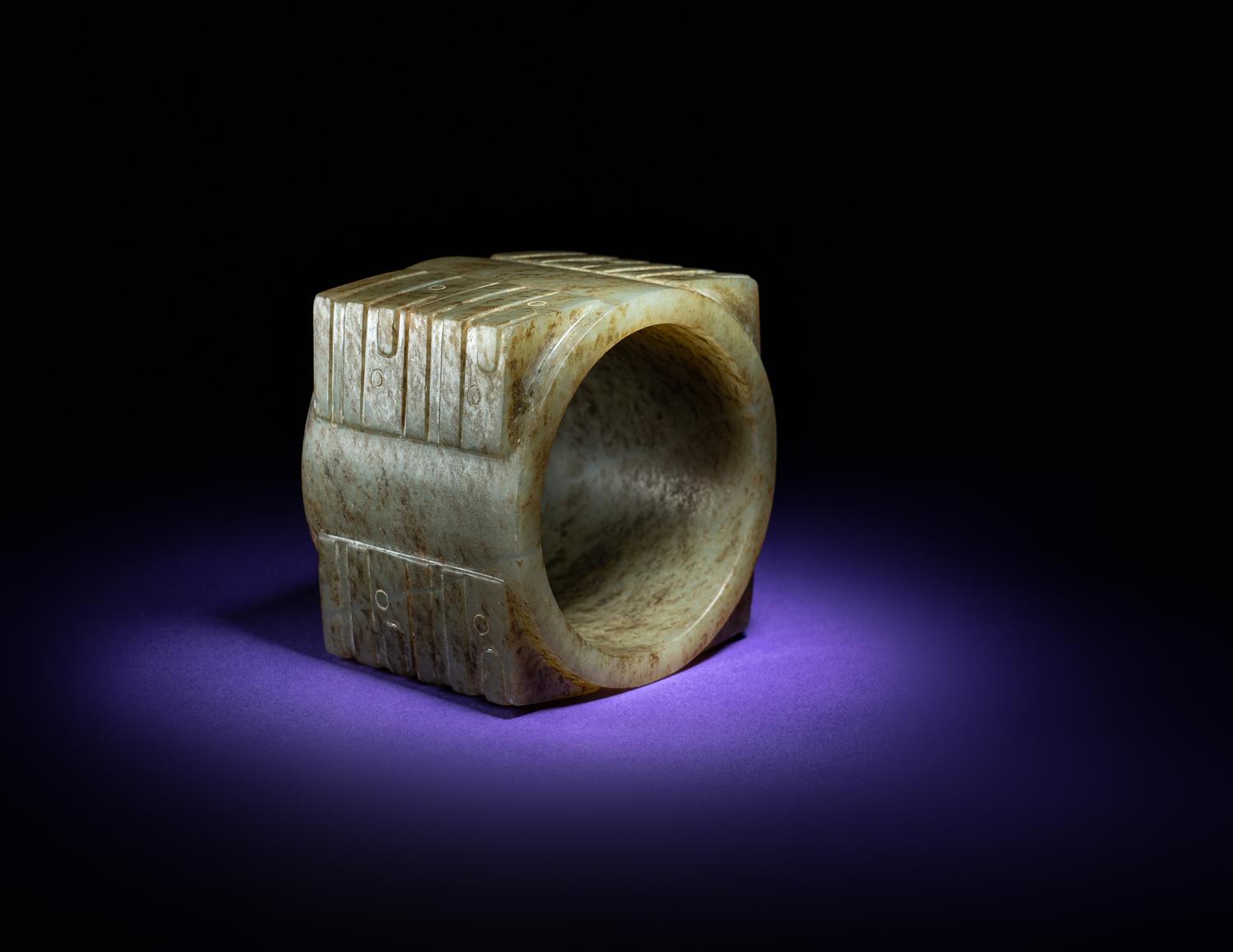 A Chinese Mottled Russet and Yellow Jade Cong