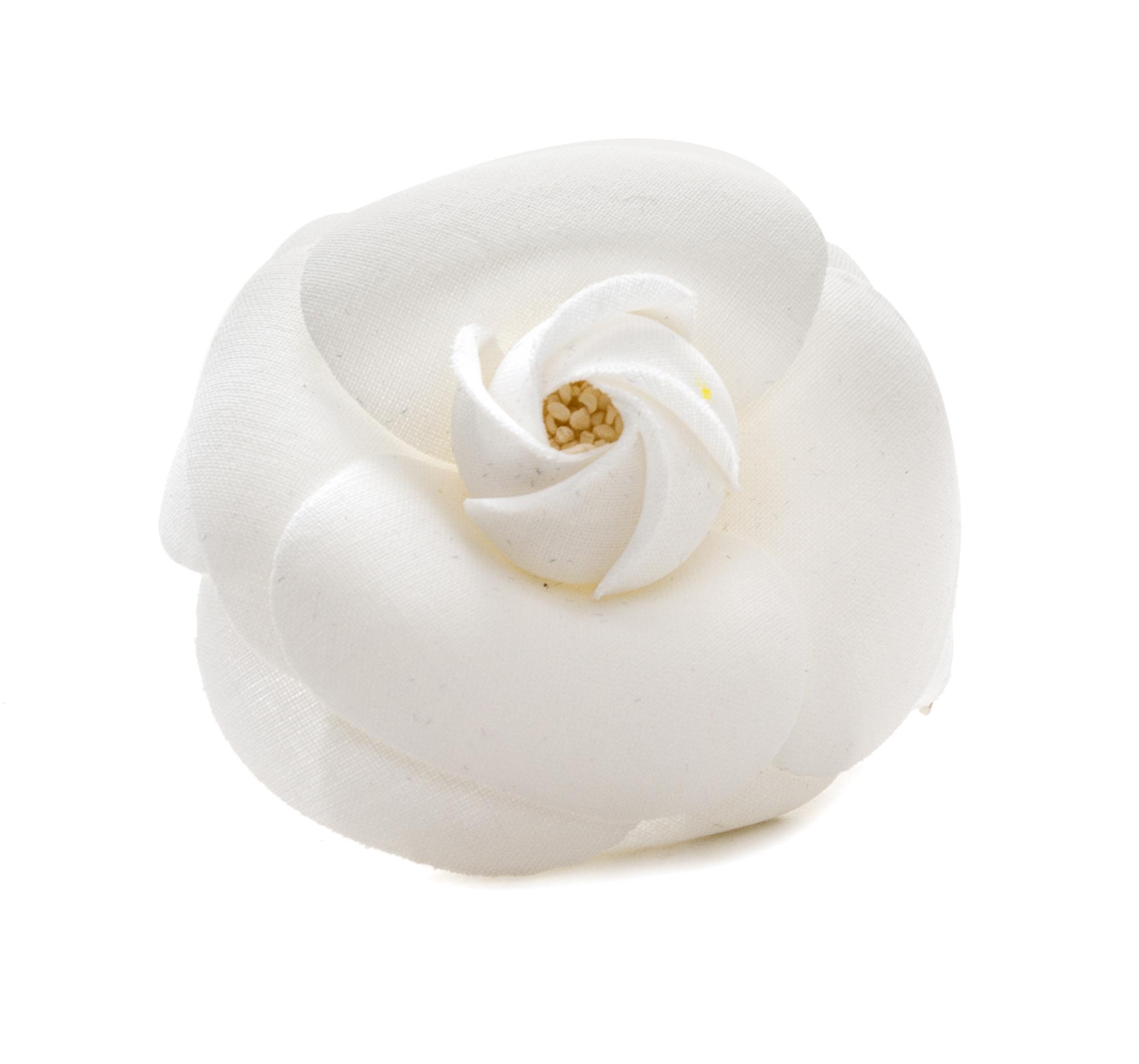 A Chanel White Fabric Camelia Brooch, 3" x 2.5".