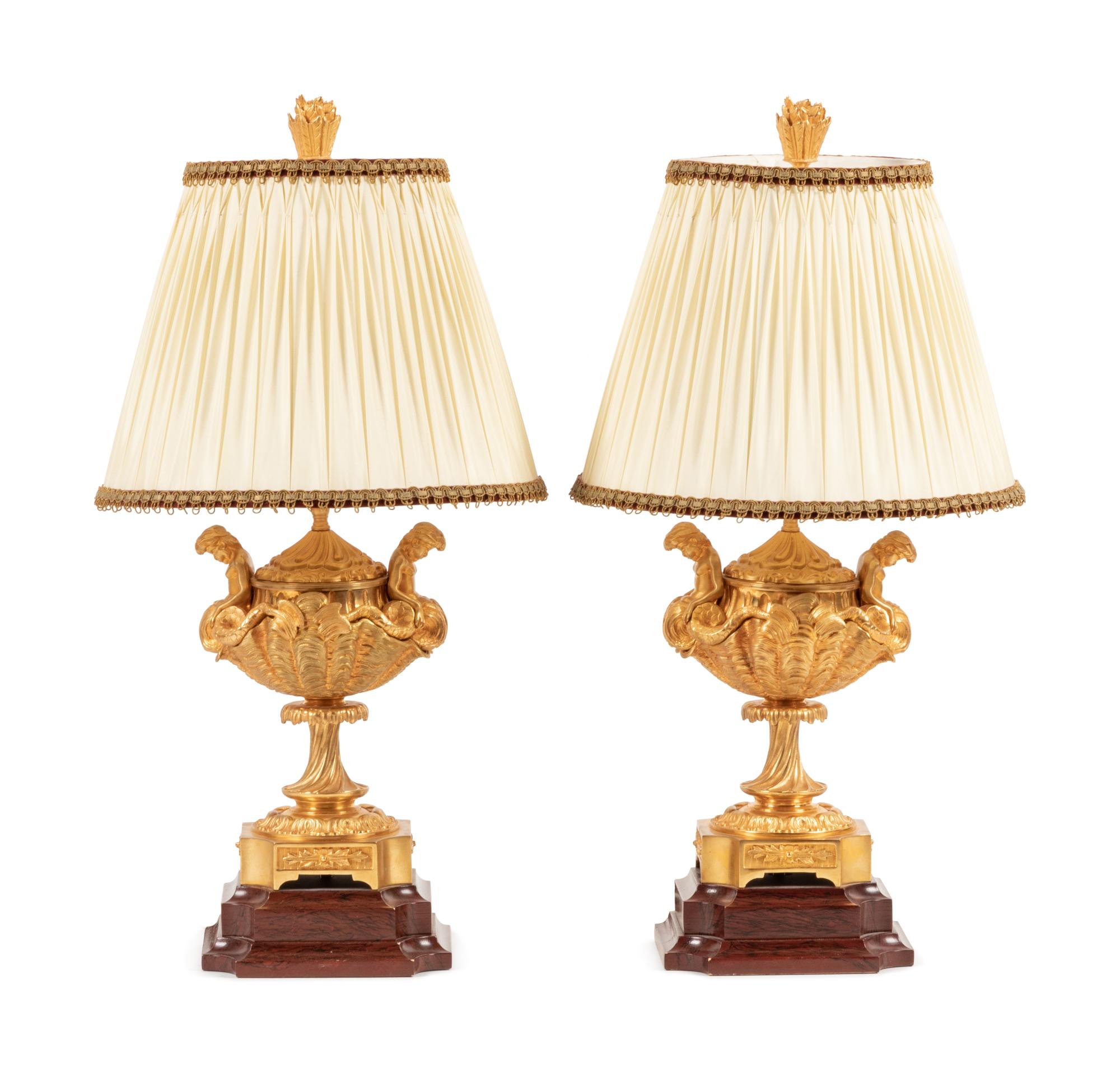 A Pair of Continental Gilt Bronze Covered Urns Mounted as Lamps