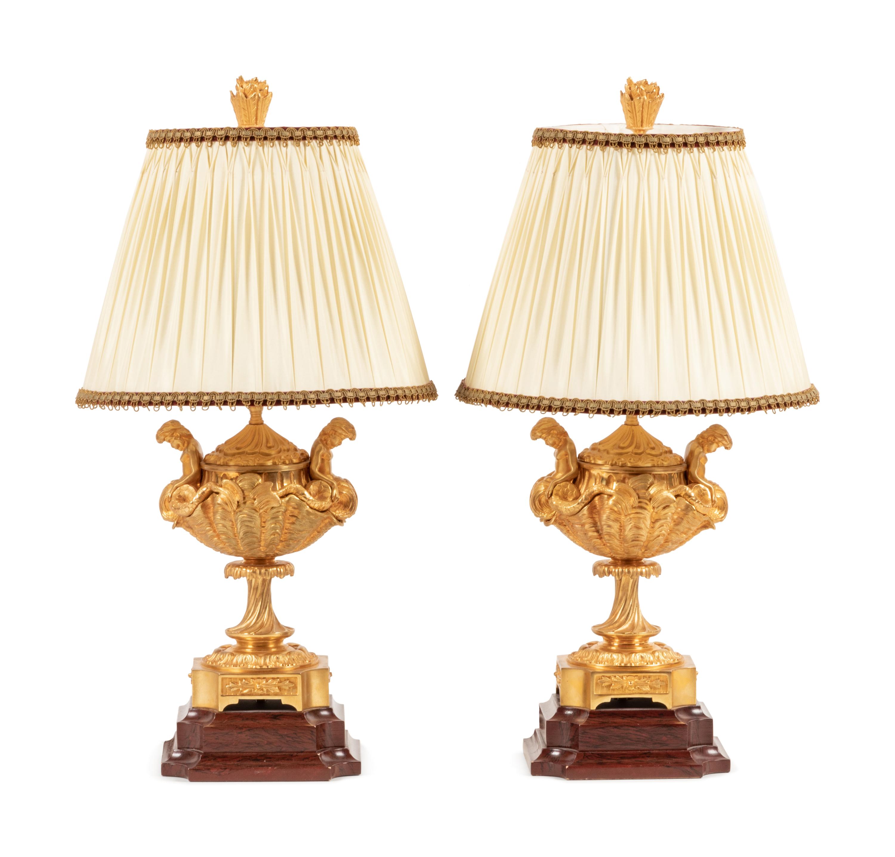 A Pair of Continental Gilt Bronze Covered Urns Mounted as Lamps