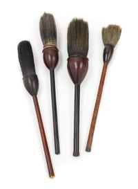 Four Chinese Hardwood Calligraphy Brushes Length of largest 7 inches. — QING DYNASTY (1644-1911)