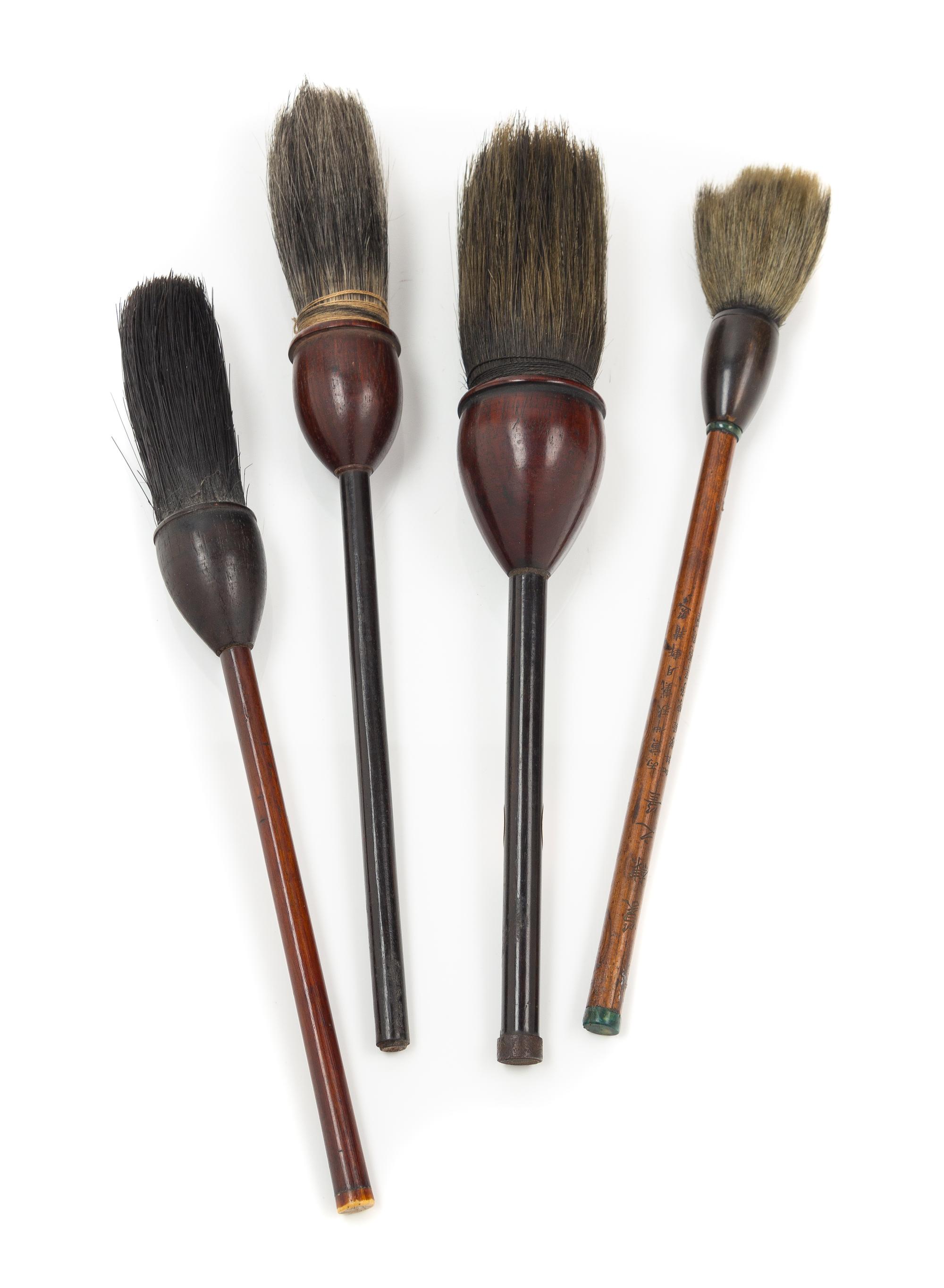 Four Chinese Hardwood Calligraphy Brushes Length of largest 7 inches. — QING DYNASTY (1644-1911)
