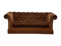 A Chesterfield Style Velvet-Upholstered Sofa with a Fringed Skirt