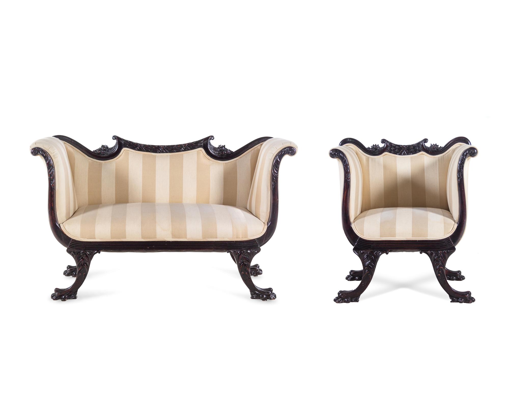 A Victorian Mahogany Settee and Armchair