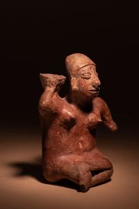 A Colima Terracotta Female with Basket Figure